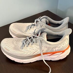 Hoka Light Gray Running Shoes with Orange Trim